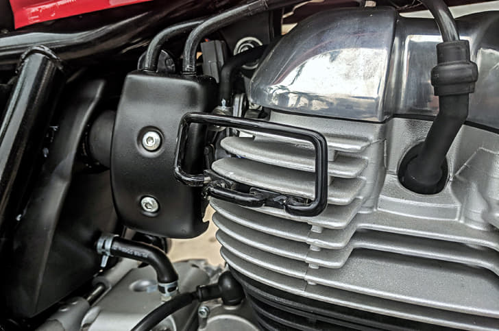 Small metal protector that helps your leg not come in contact with the engine.